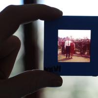  Fingers holding a photo of an elderly couple